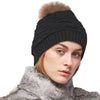 SIDSE knitted hat in wool with a nice fur pom in several colours